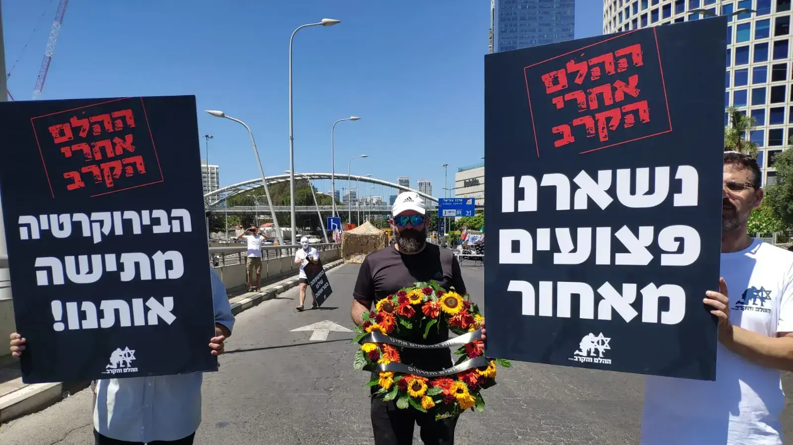 מחאת "הגיבורים השקופים" - של עמותת "ההלם והקרב", קריה, תל אביב, 14 ביולי 2019 מחאת "הגיבורים השקופים" - של עמותת "ההלם והקרב", קריה, תל אביב, 14 ביולי 2019