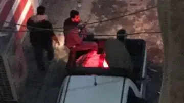 חמושים יורים לעבר מפגינים, בגדאד, עיראק, 6 בדצמבר 2019 חמושים יורים לעבר מפגינים, בגדאד, עיראק, 6 בדצמבר 2019