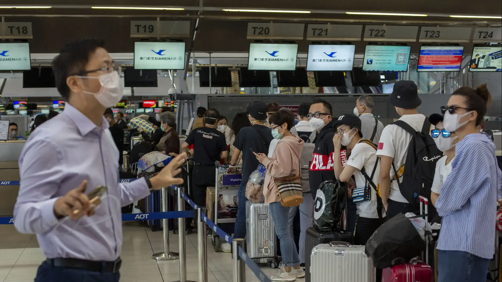 אנשים חובשים מסכות בנמל התעופה בבנקוק תאילנד מחשש לנגיף הקורונה ב-31 בינואר 2020