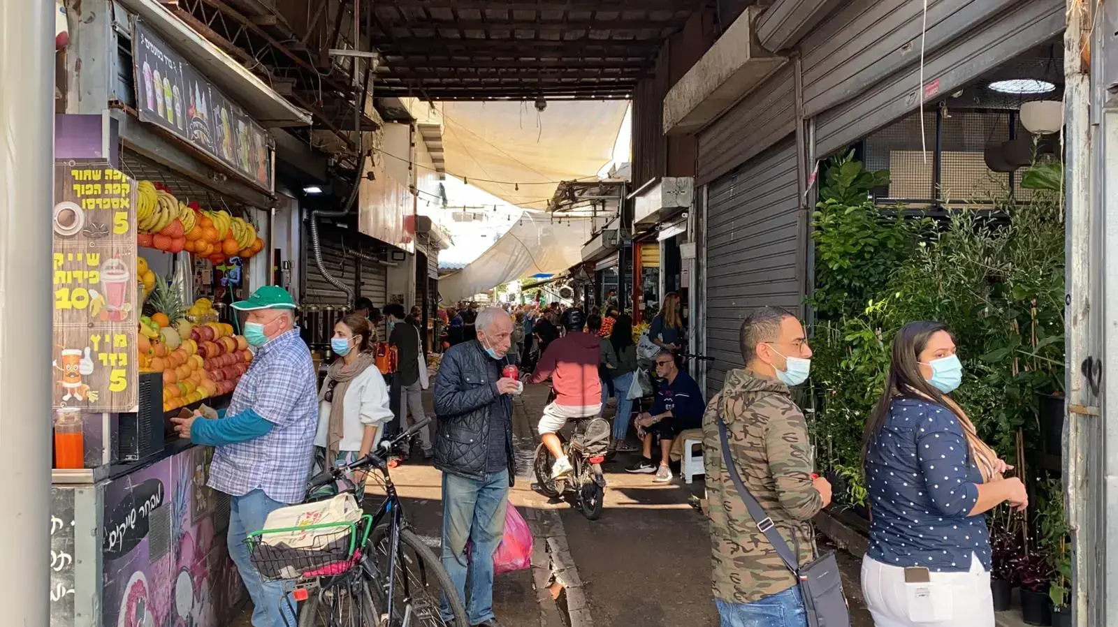 שוק הכרמל פתוח לאחר הסרת הגבלות הקורונה, 27 בנובמבר 2020 שוק הכרמל פתוח לאחר הסרת הגבלות הקורונה, 27 בנובמבר 2020