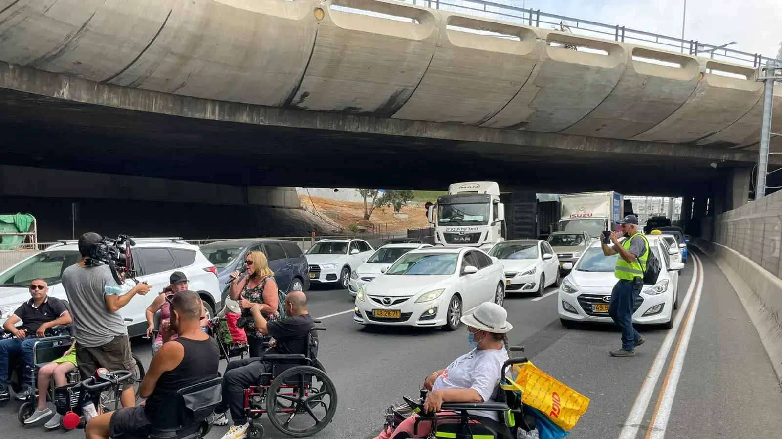 הפגנת נכים במחלף ארלוזורוב 25 ביולי 2021 הפגנת נכים במחלף ארלוזורוב 25 ביולי 2021