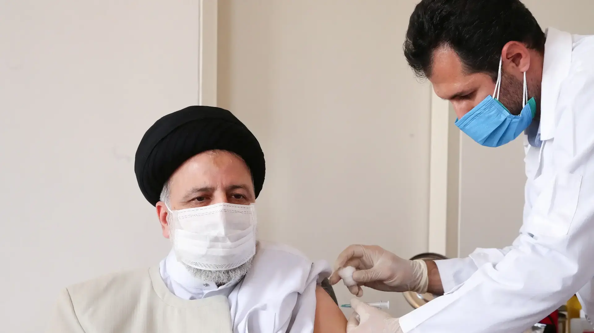 Iran's President Ebrahim Raisi receives the first dose of the Iranian CV-vaccine against coronavirus disease (COVID-19) in Tehran, Iran August 8, 2021. Official Presidential Website/Handout via REUTERS ATTENTION EDITORS - THIS IMAGE WAS PROVIDED BY A THIRD PARTY. NO RESALES. NO ARCHIVES.
Iran's President Ebrahim Raisi receives the first dose of the Iranian CV-vaccine against coronavirus disease (COVID-19) in Tehran, Iran August 8, 2021. Official Presidential Website/Handout via REUTERS ATTENTION EDITORS - THIS IMAGE WAS PROVIDED BY A THIRD PARTY. NO RESALES. NO ARCHIVES.