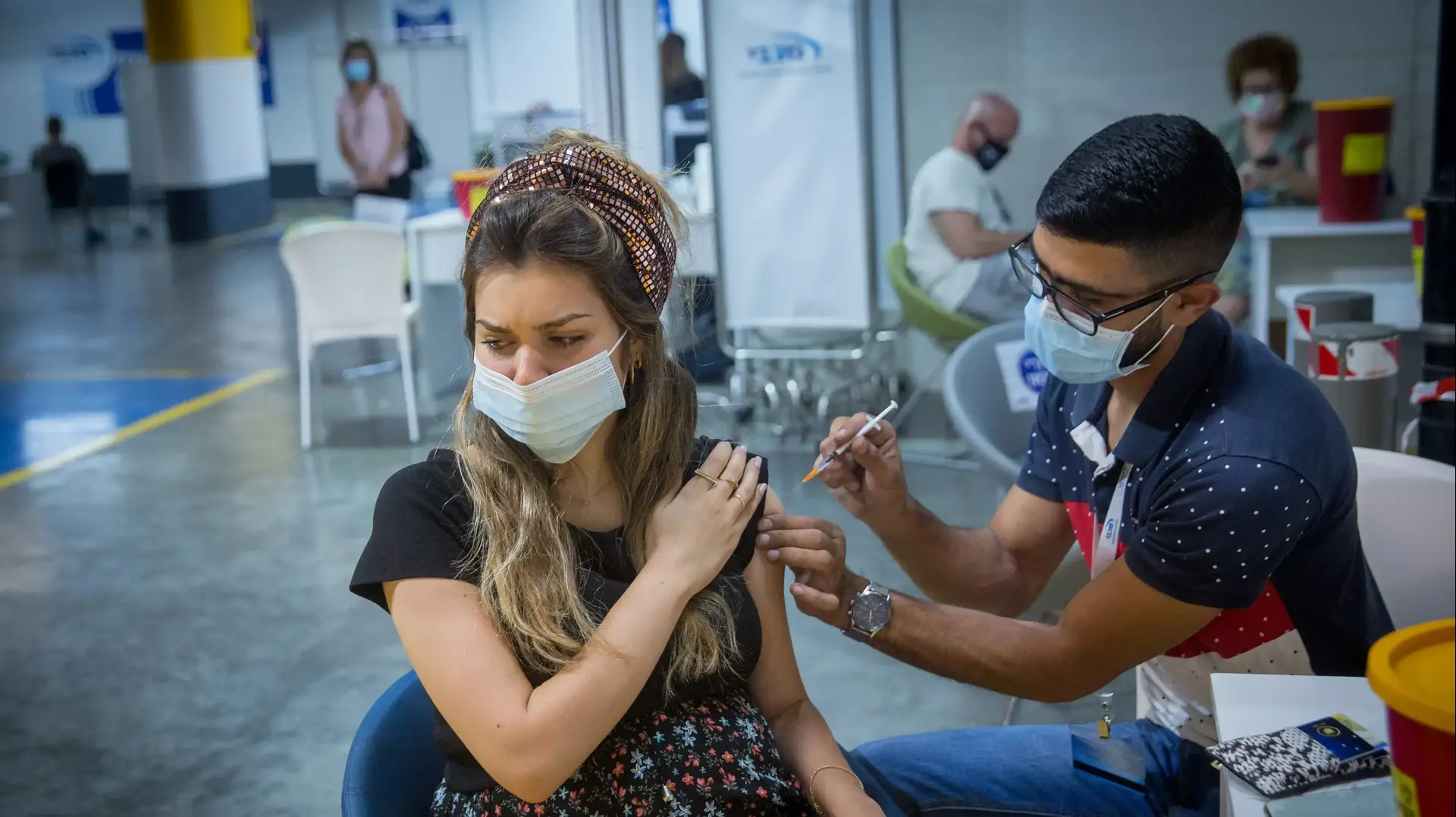 אישה בהריון עוברת חיסון לנגיף הקורונה 23 באוגוסט 2021