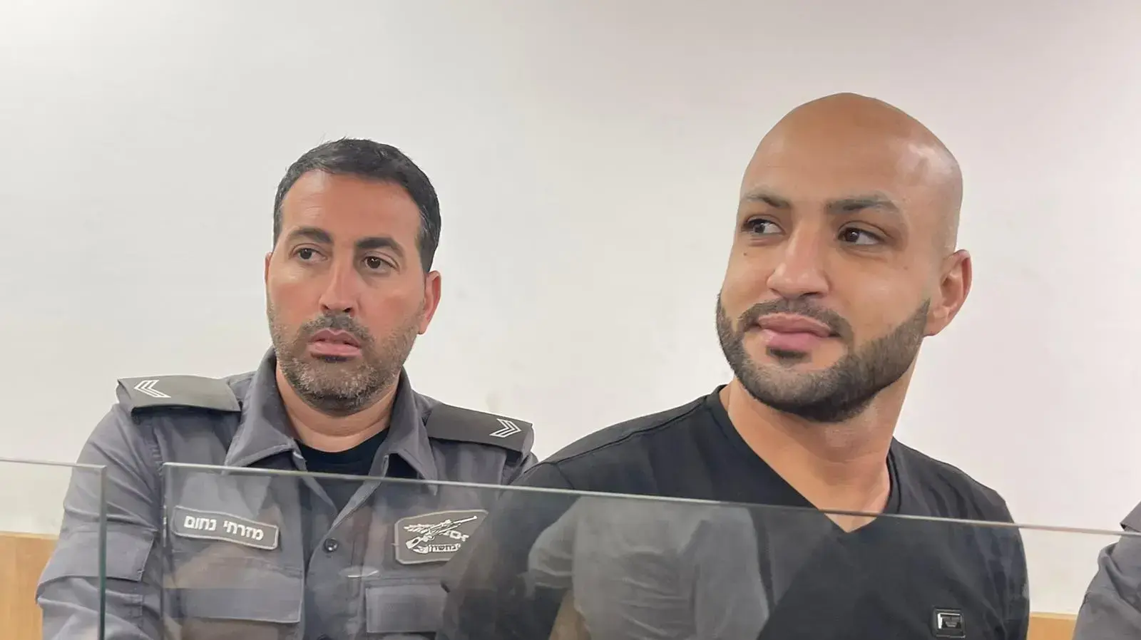 ווללאא רובין חלאילה, החשוד ברצח בת זוגו ספיר נחום. דיון בבית המשפט השלום בעכו, 11 ביולי 2022 ווללאא רובין חלאילה, החשוד ברצח בת זוגו ספיר נחום. דיון בבית המשפט השלום בעכו, 11 ביולי 2022