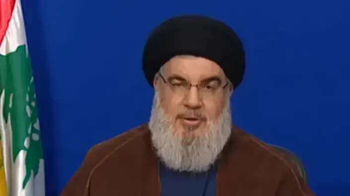 מזכ"ל חיזבאללה, חסן נסראללה במהלך נאומו 13 ביולי 2022 מזכ"ל חיזבאללה, חסן נסראללה במהלך נאומו 13 ביולי 2022