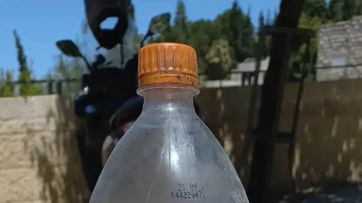 הבקבוק ששימש להצתת רכבו של הרב דב ליאור הבקבוק ששימש להצתת רכבו של הרב דב ליאור