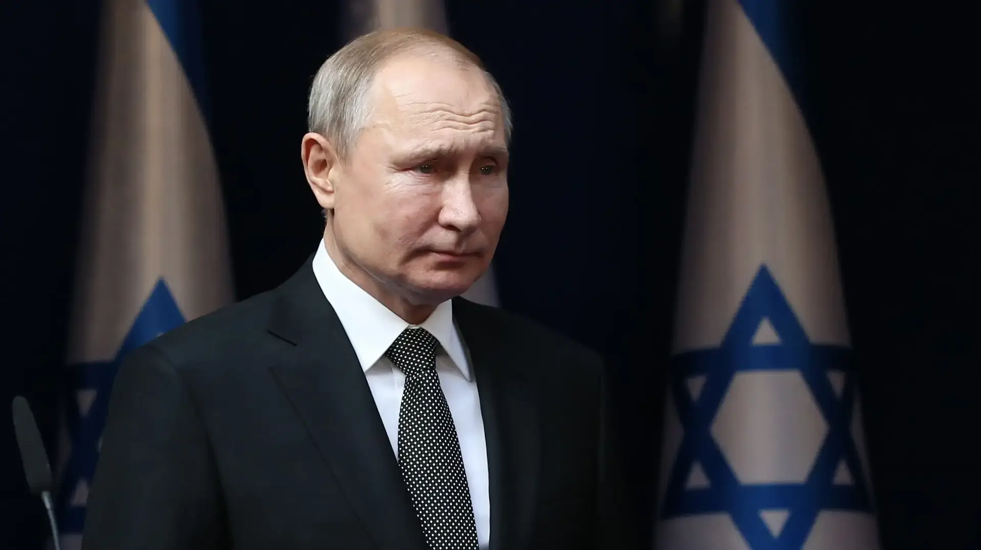 נשיא רוסיה ולדימיר פוטין על רקע דגלי ישראל במהלך ביקור בירושלים, 23.1.2020 נשיא רוסיה ולדימיר פוטין על רקע דגלי ישראל במהלך ביקור בירושלים, 23.1.2020