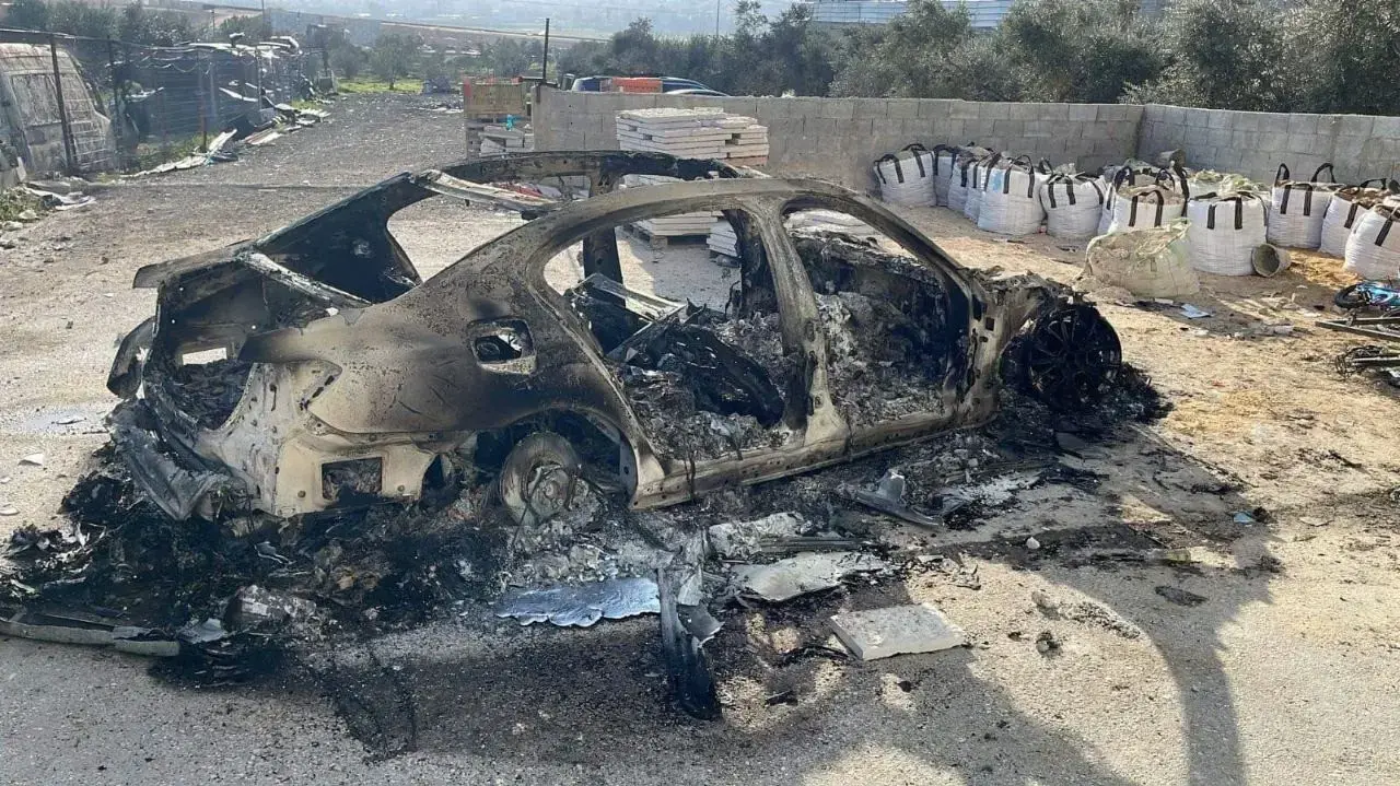 רכב שרוף לאחר ההתפרעויות בחווארה, 27 בפברואר 2023 רכב שרוף לאחר ההתפרעויות בחווארה, 27 בפברואר 2023