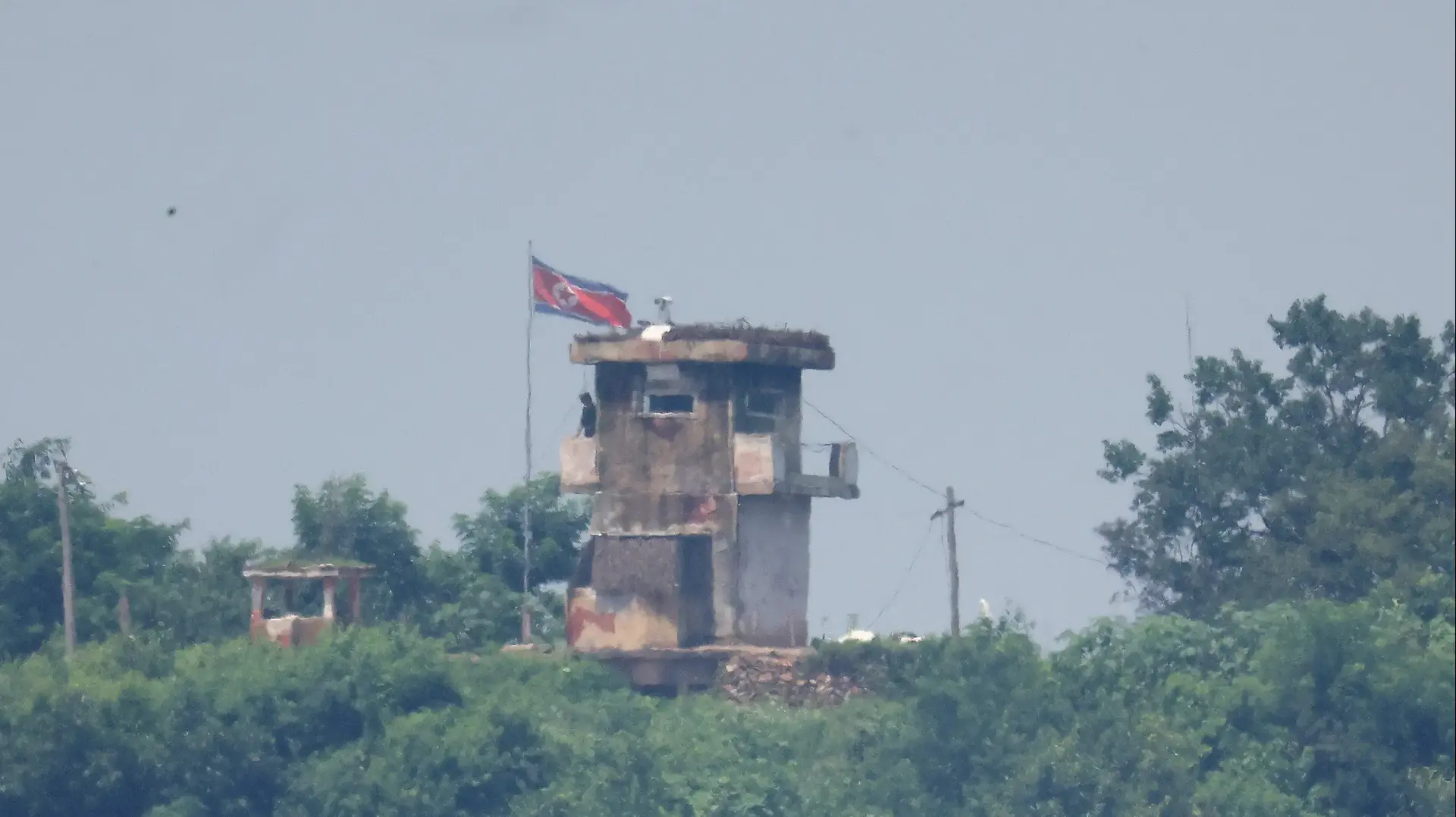 A North Korean soldier stands guard at their guard post in this picture taken near the demilitarized zone separating the two Koreas, in Paju, South Korea July 19, 2023. REUTERS/Kim Hong-Ji
A North Korean soldier stands guard at their guard post in this picture taken near the demilitarized zone separating the two Koreas, in Paju, South Korea July 19, 2023. REUTERS/Kim Hong-Ji