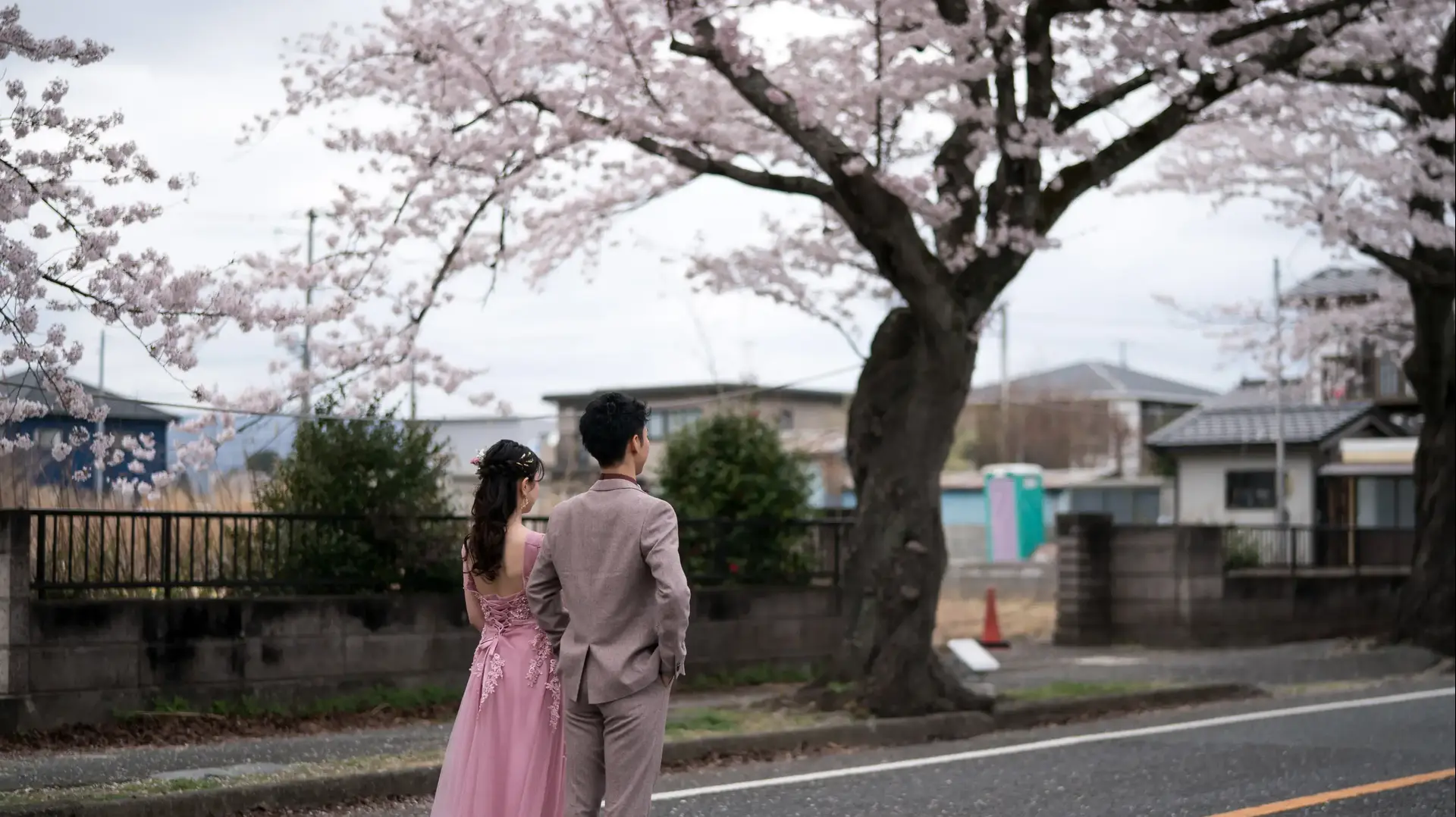 TOMIOKA, JAPAN - APRIL 02: A couple poses for a wedding photograph near cherry trees in bloom in the Yonomori area on April 02, 2023 in Tomioka, Fukushima, Japan. The evacuation order for the Yonomori area was lifted on April 1 for the first time in twelve years since the area was designated as a "difficult-to-return" zone following the Fukushima Dai-ichi nuclear power plant disaster in 2011. (Photo by Tomohiro Ohsumi/Getty Images)
TOMIOKA, JAPAN - APRIL 02: A couple poses for a wedding photograph near cherry trees in bloom in the Yonomori area on April 02, 2023 in Tomioka, Fukushima, Japan. The evacuation order for the Yonomori area was lifted on April 1 for the first time in twelve years since the area was designated as a "difficult-to-return" zone following the Fukushima Dai-ichi nuclear power plant disaster in 2011. (Photo by Tomohiro Ohsumi/Getty Images)