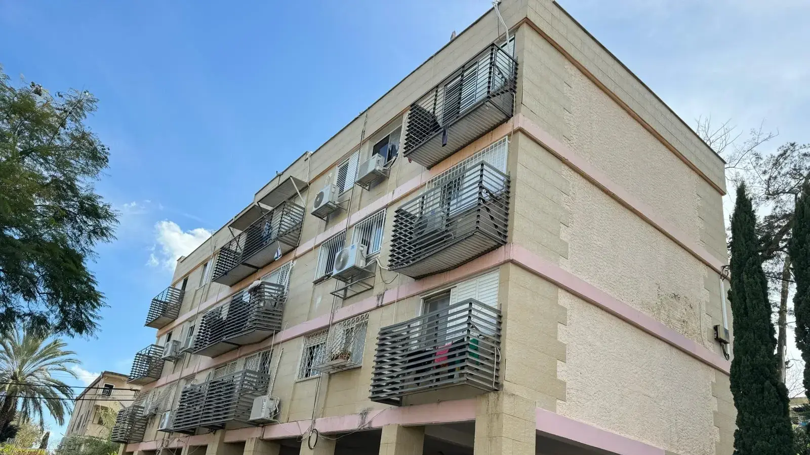 הבניין שבו התגוררה קורבן הרצח הודיה גבאי בקרית אתא הבניין שבו התגוררה קורבן הרצח הודיה גבאי בקרית אתא
