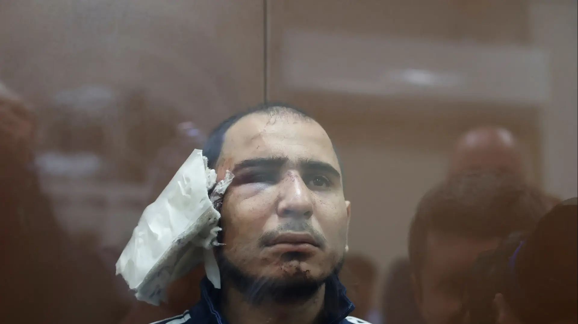 אחד המחבלים שביצעו את הפיגוע באולם הקונצרטים במוסקבה, סיידקראמי מורודלי רחבליזודה,בדיון בבית המשפט, רוסיה, 24 במרץ 2024 אחד המחבלים שביצעו את הפיגוע באולם הקונצרטים במוסקבה, סיידקראמי מורודלי רחבליזודה,בדיון בבית המשפט, רוסיה, 24 במרץ 2024