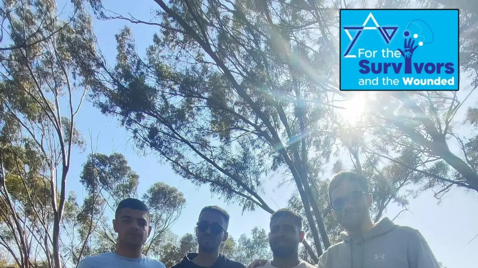 דניאל ונריה שרעבי עם לוחית הטנק שמאחוריו ניהלו את קרב היריות בטבח בפסטיבל נובה דניאל ונריה שרעבי עם לוחית הטנק שמאחוריו ניהלו את קרב היריות בטבח בפסטיבל נובה
