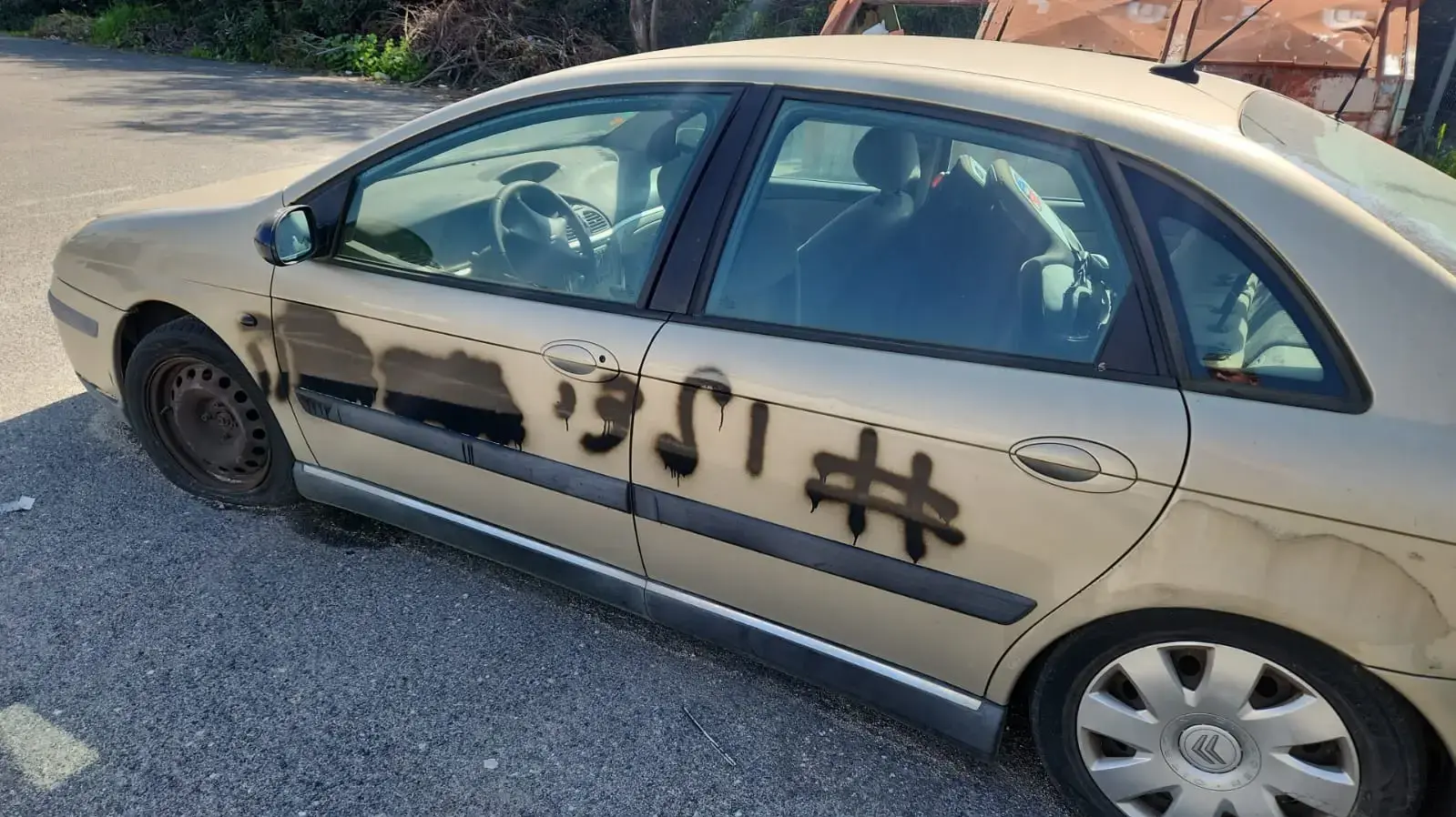 הגראפיטי עם כיתוב "ילדי רוחלה" שהחשוד ביצע כחלק ממשימות עבור האיראנים הגראפיטי עם כיתוב "ילדי רוחלה" שהחשוד ביצע כחלק ממשימות עבור האיראנים