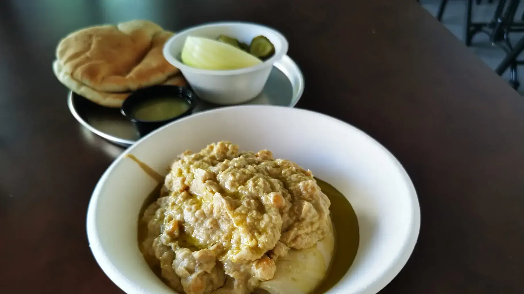 מנת חומוס משוואשה של החומוס של אבי מעכו 