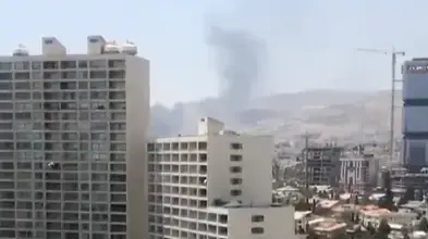 עשן שהיתמר מהבירה טהראן, מתקיפות חיל-האוויר, 16 ביוני 2025