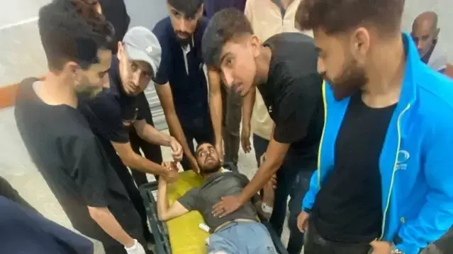 אחמד אל מסרי אחרי שעונה על ידי חמאס 