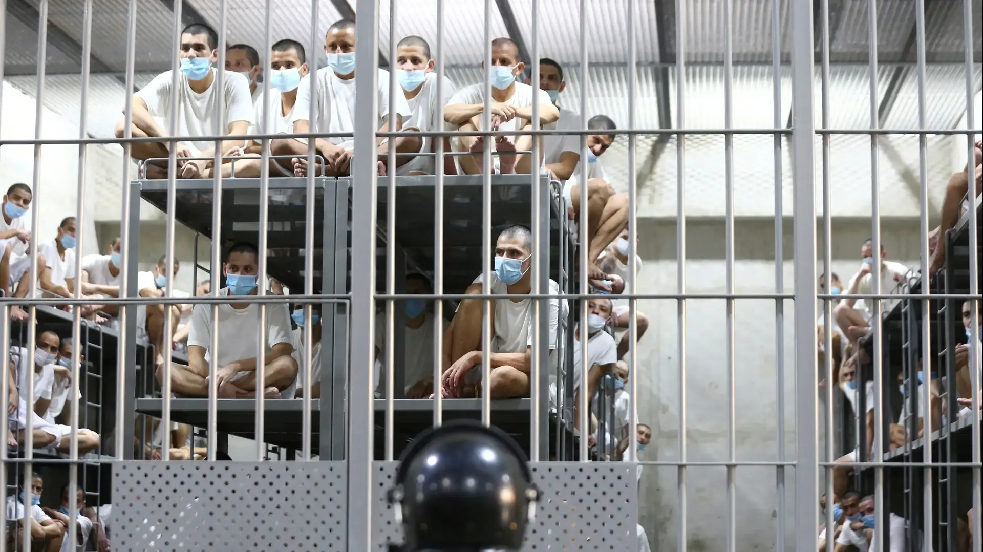 Inmates look on inside a jail during a media tour at the Terrorism Confinement Center (CECOT) prison, in Tecoluca, El Salvador April 4, 2025. Inmates look on inside a jail during a media tour at the Terrorism Confinement Center (CECOT) prison, in Tecoluca, El Salvador April 4, 2025.