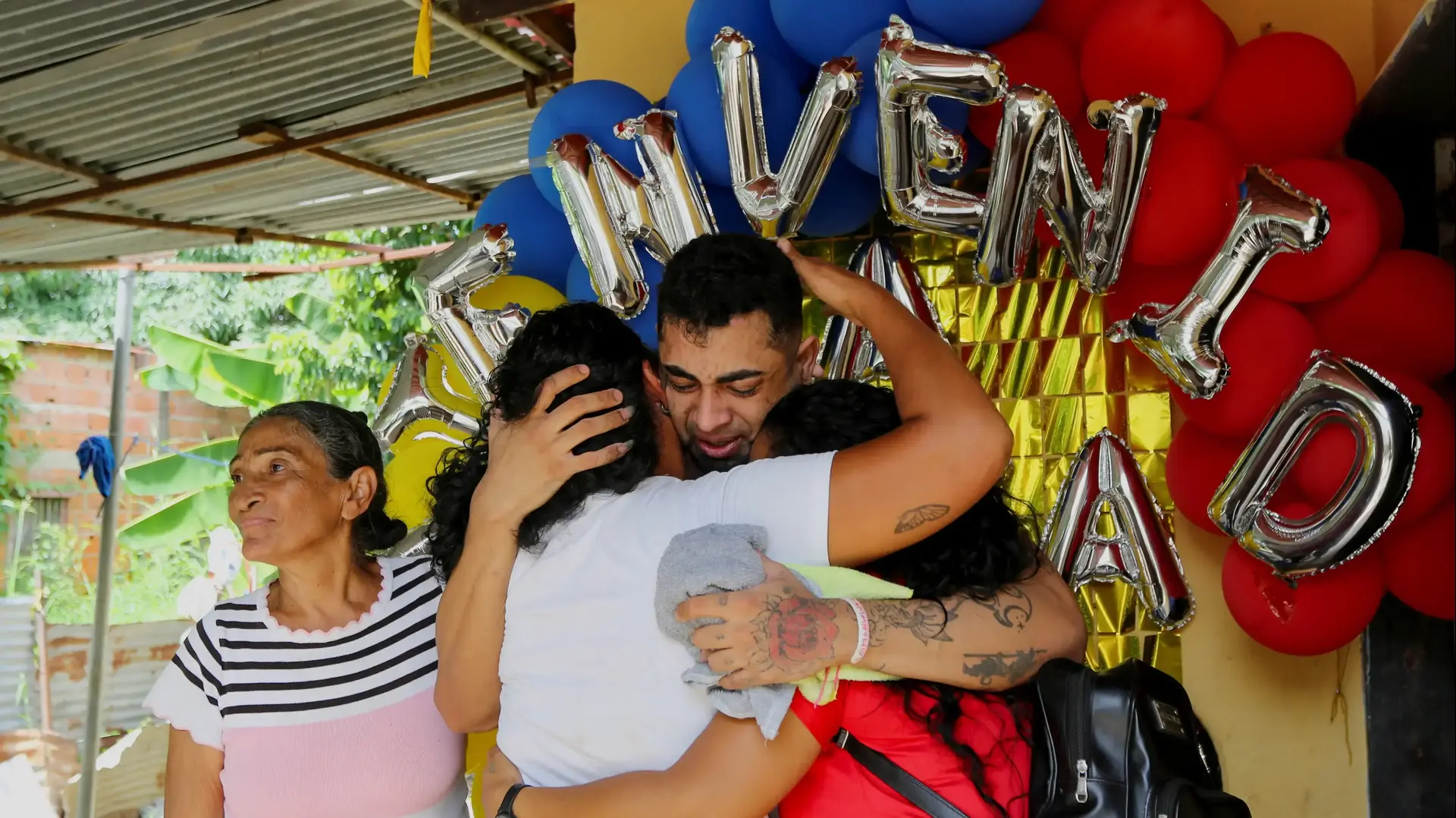 Wild Yahare Chirino, who was held for months in an El Salvador prison after the U.S. alleged he was a member of the Tren de Aragua gang, embraces family members at home after his release, in Valencia, Venezuela July 22, 2025. REUTERS/Juan Carlos Hernandez Wild Yahare Chirino, who was held for months in an El Salvador prison after the U.S. alleged he was a member of the Tren de Aragua gang, embraces family members at home after his release, in Valencia, Venezuela July 22, 2025. REUTERS/Juan Carlos Hernandez
