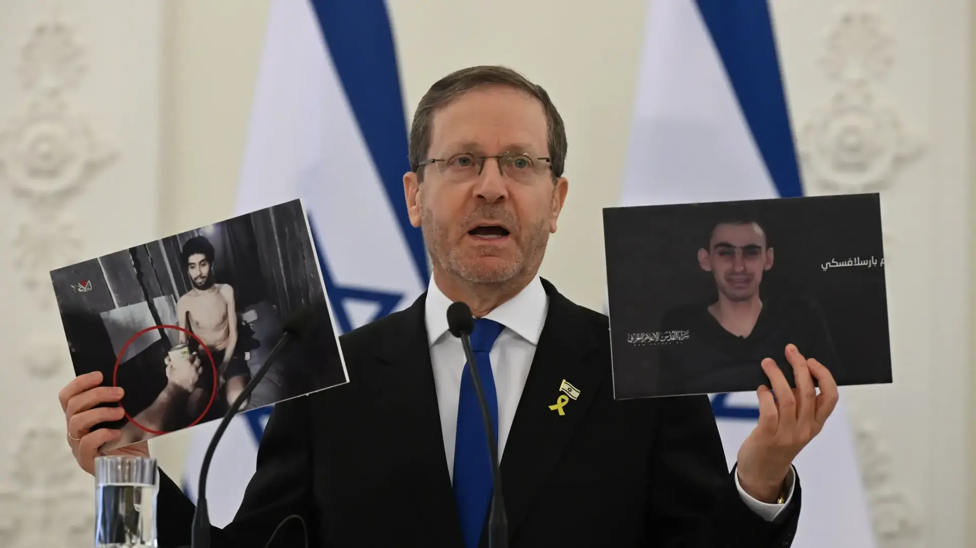 נשיא המדינה יצחק הרצוג מציג את תמונותיהם של אביתר ורום מהשבי מול נשיא ליטא, 4 באוגוסט 2025