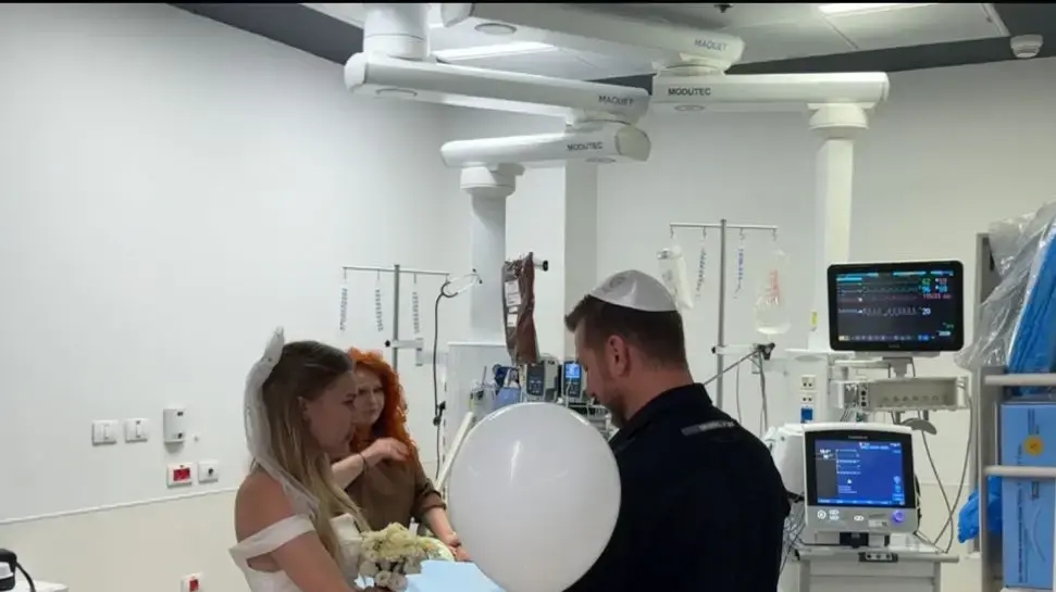 קטרינה התחתנה ליד מיטת אביה החולה בבי"ח אסותא אשדוד