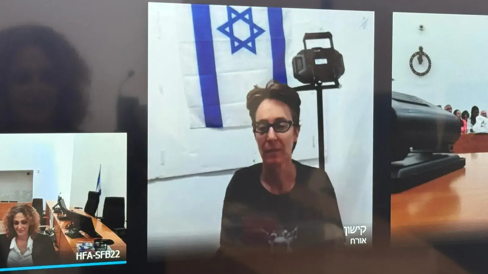 יולנדה יבור בדיון בהיוועדות חזותית מבית המעצר קישון, 12 בספטמבר 2025