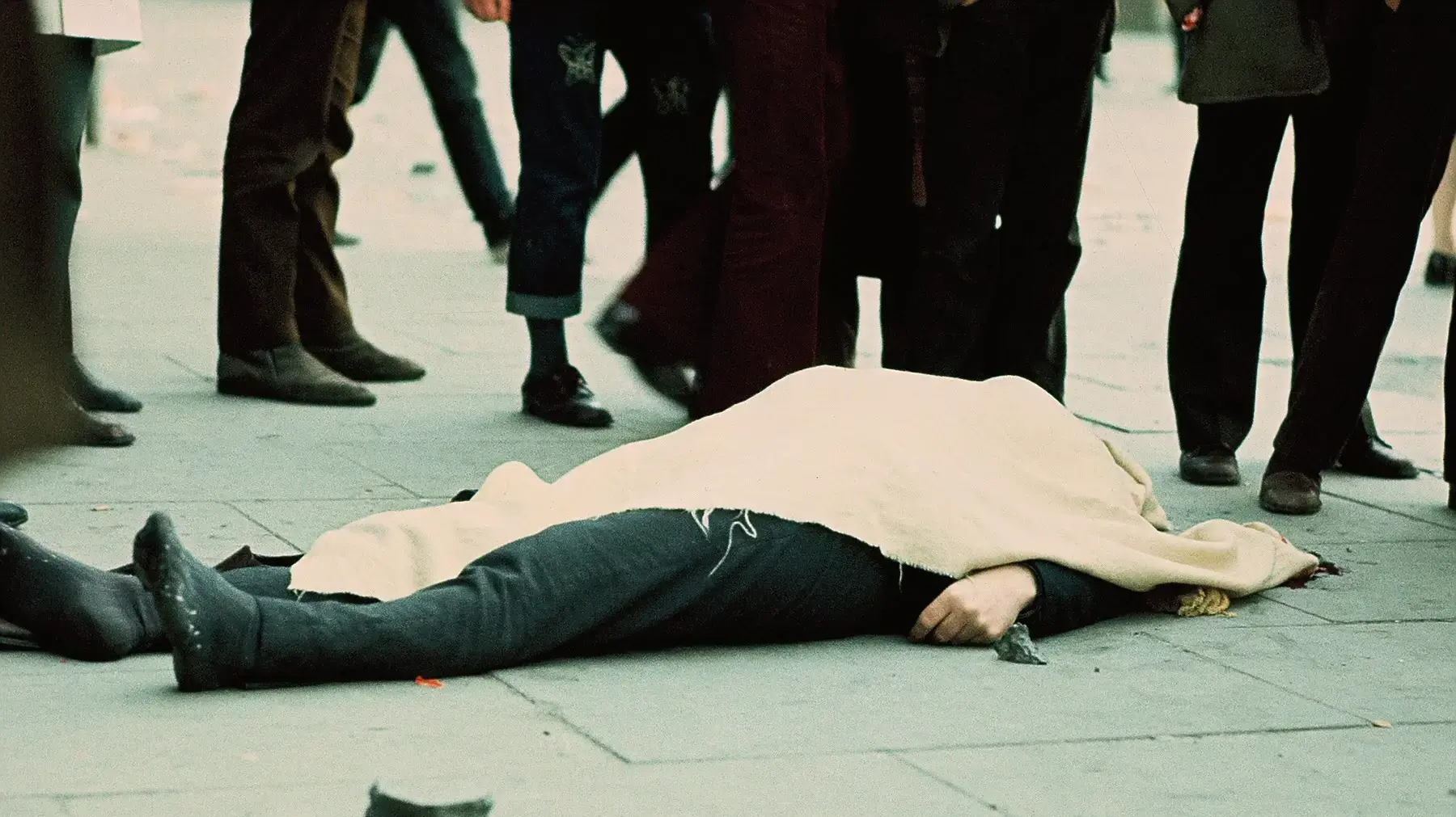 A victim of the shooting by British paratroopers of 14 civilians during a civil rights march lies on the pavement near to Rossville Flats in Londonderry. The day became known as Bloody Sunday. 30th January 1972 (Photo by William L. Rukeyser/Getty Images)
A victim of the shooting by British paratroopers of 14 civilians during a civil rights march lies on the pavement near to Rossville Flats in Londonderry. The day became known as Bloody Sunday. 30th January 1972 (Photo by William L. Rukeyser/Getty Images)