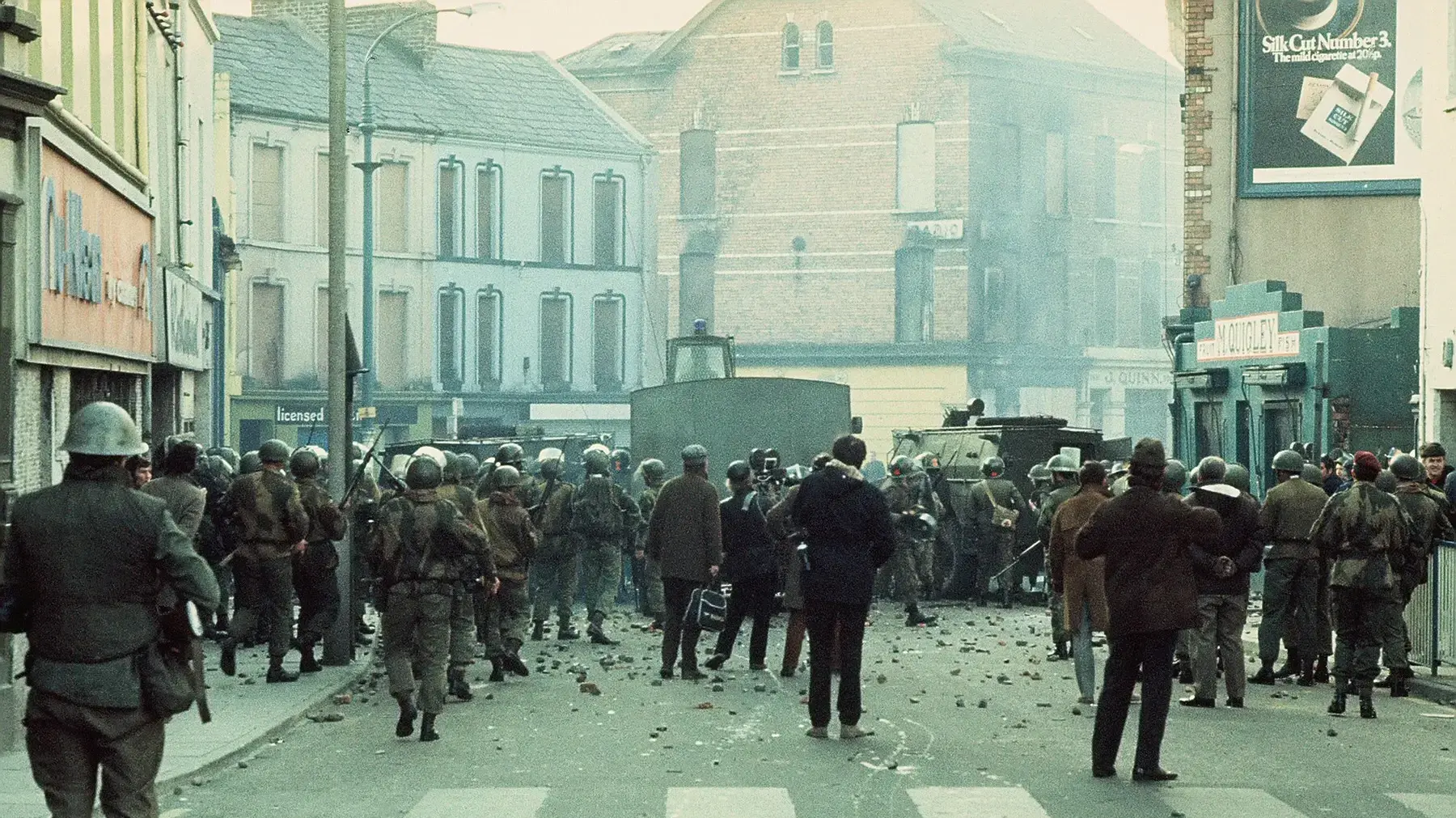 30th January 1972. British soldiers and members of the press are pictured behind armoured water cannon and armoured cars as tensions rise during a civil rights march in Derry. Soldiers opened fire on the civil rights march, killing 14 on what became known as Bloody Sunday. (Photo by William L. Rukeyser/Getty Images)
30th January 1972. British soldiers and members of the press are pictured behind armoured water cannon and armoured cars as tensions rise during a civil rights march in Derry. Soldiers opened fire on the civil rights march, killing 14 on what became known as Bloody Sunday. (Photo by William L. Rukeyser/Getty Images)