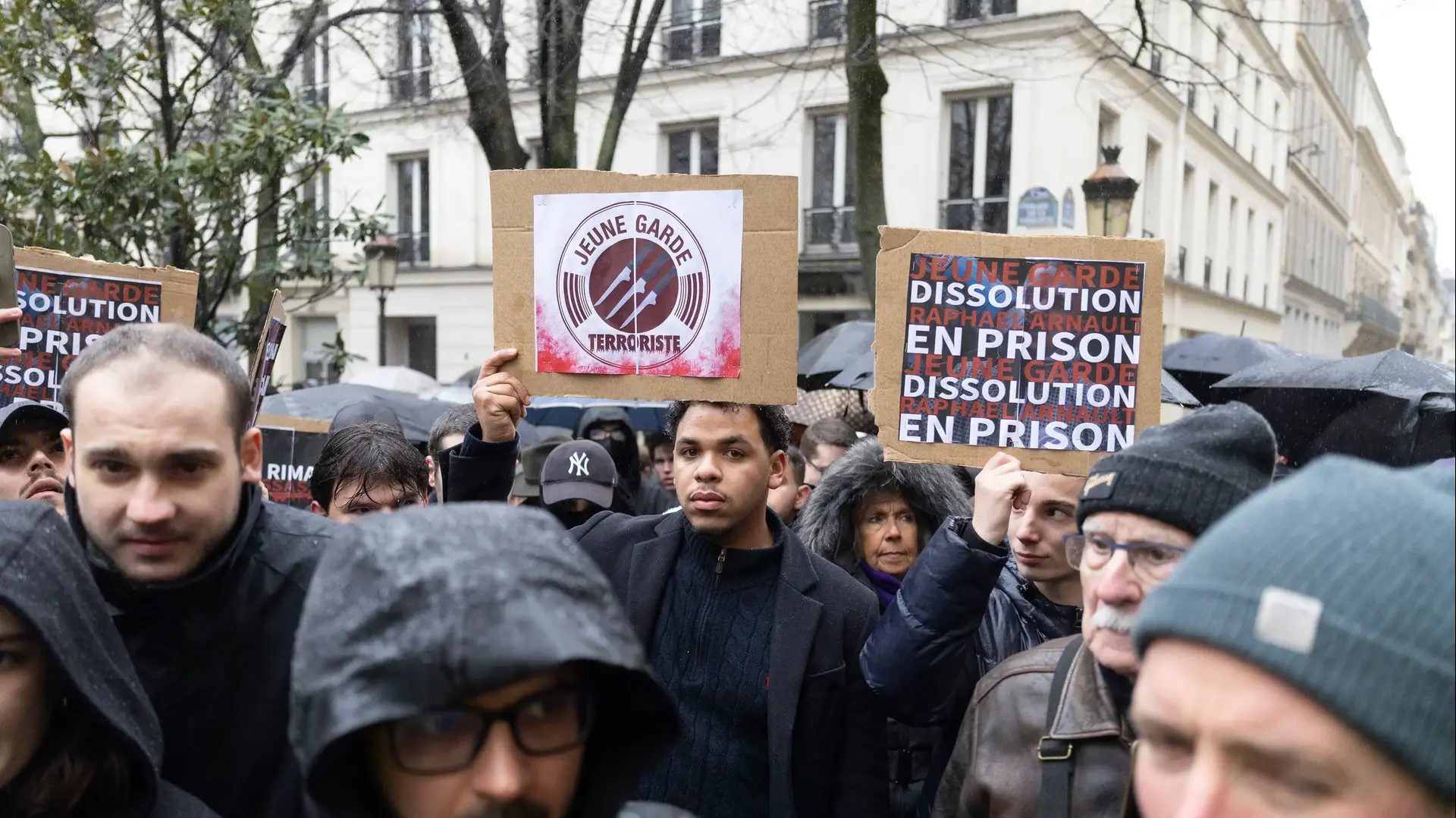 Protesters hold up signs calling for the dissolution of the far-left group Jeune Garde during a rally in tribute to Quentin Deranque, a far-right activist killed by anti-fascist activists. Paris, France, February 15, 2026. Protesters hold up signs calling for the dissolution of the far-left group Jeune Garde during a rally in tribute to Quentin Deranque, a far-right activist killed by anti-fascist activists. Paris, France, February 15, 2026.