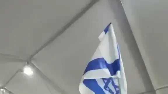 השר לביטחון לאומי, איתמר בן גביר על ספינה מול פעילי המשט לעזה, בנמל אשדוד, 20 במאי 2026 השר לביטחון לאומי, איתמר בן גביר על ספינה מול פעילי המשט לעזה, בנמל אשדוד, 20 במאי 2026