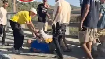 אילן מנס הותקף כשניסה להוריד את שלט ׳ישוחרר יגאל עמיר׳