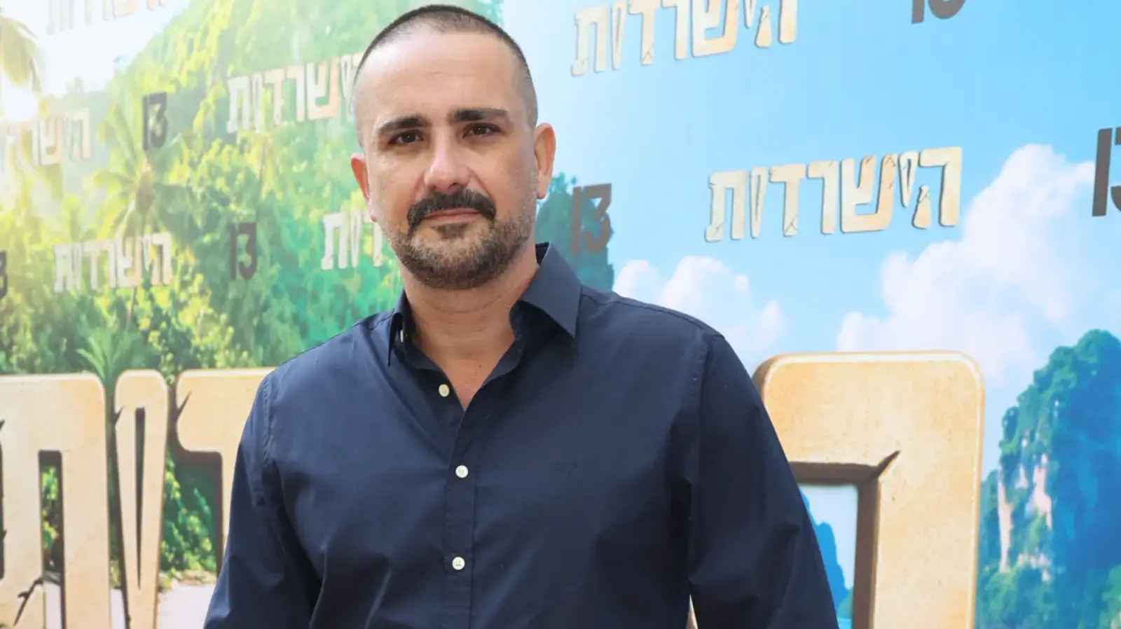 אבי שושן בהשקה של "הישרדות" אבי שושן בהשקה של "הישרדות"
