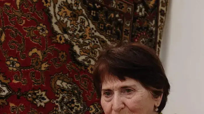 מריה, ניצולת שואה עם חתוליה