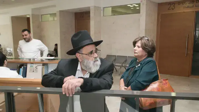 גאולה ושלמה עמיר, הוריו של יגאל עמיר, בדיון בבית המשפט המחוזי, 2011 גאולה ושלמה עמיר, הוריו של יגאל עמיר, בדיון בבית המשפט המחוזי, 2011
