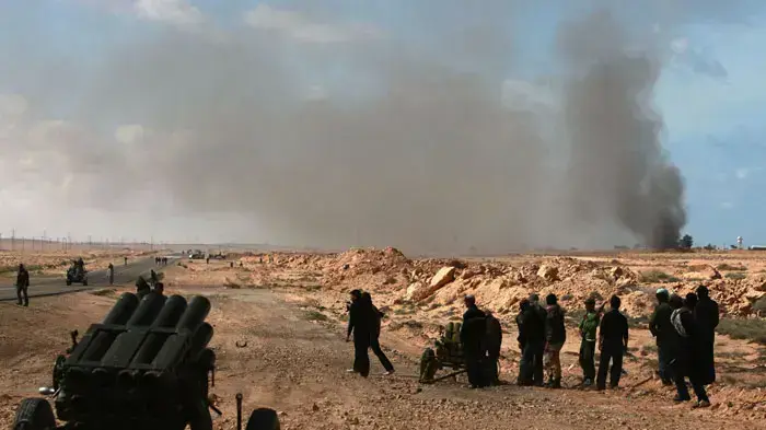 מורדים נלחמים באזור העיר בן-ג'וואד בלוב, 6 במרץ 2011 מורדים נלחמים באזור העיר בן-ג'וואד בלוב, 6 במרץ 2011