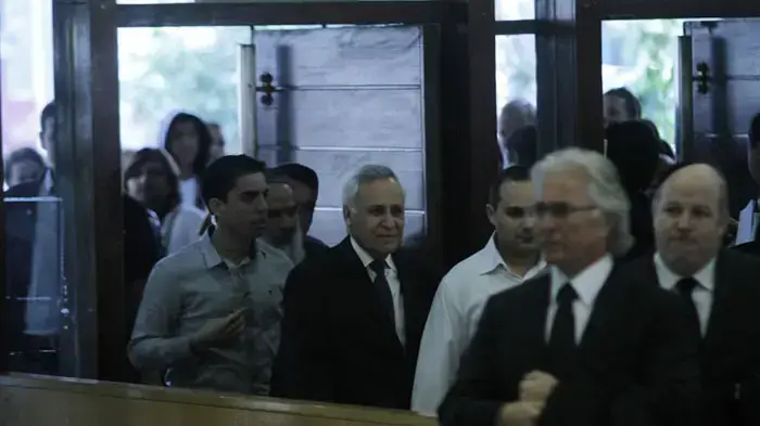 משה קצב ביציאה מבית המשפט לאחר הקראת גזר דינו, מרץ 2011