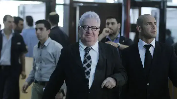 משה קצב ביציאה מבית המשפט לאחר הקראת גזר דינו, מרץ 2011