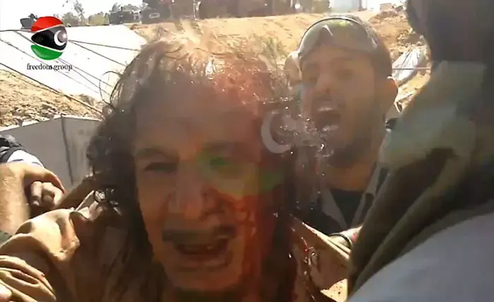 קיצו של קדאפי: צפו בלכידת הרודן בתמונות חדשות