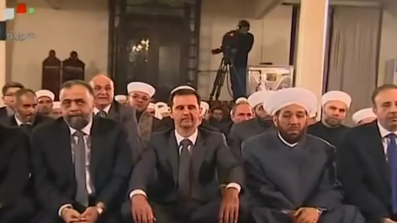 אסד בהופעה פומבית נדירה: "מוביל את הספינה לחוף מבטחים"