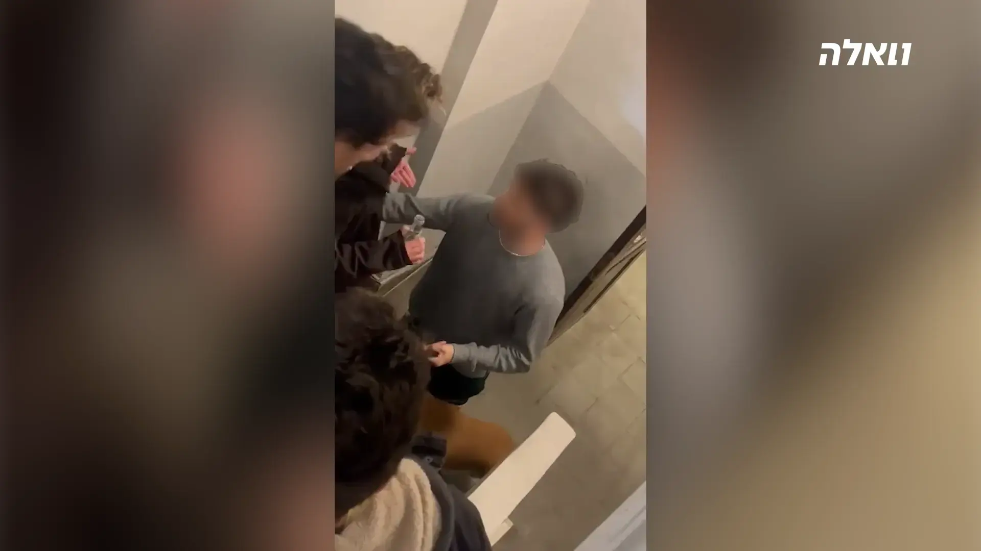 "זה שטח פרטי": האיש שמנע כניסה למקלט בזמן אזעקה בת"א עוכב לחקירה | צפו