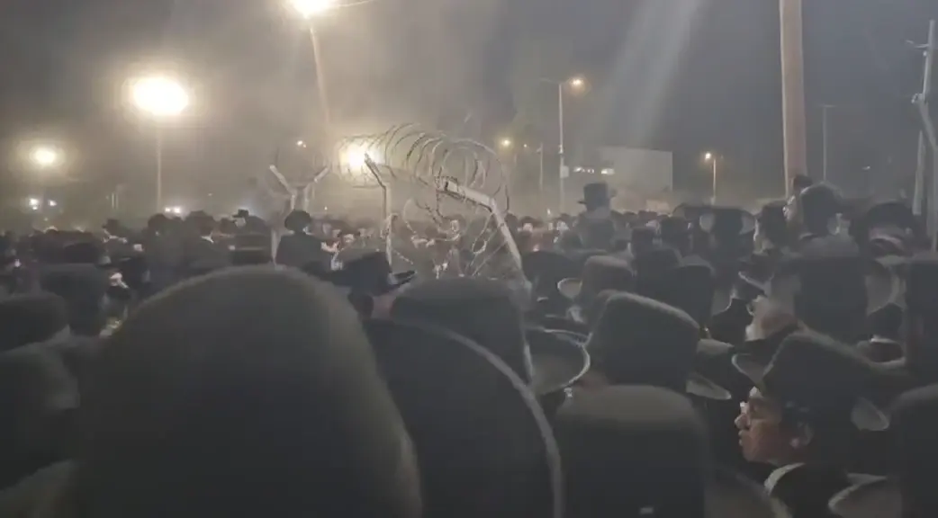 הפגנות החרדים מחוץ לכלא 10: האיש החזק בחסידות גור תועד בעימות פיזי