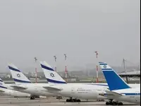 מטוסי אל על חונים בנתב"ג, שהתרוקן מנוסעים (גלובס , צילום: Ariel Schalit, AP)
