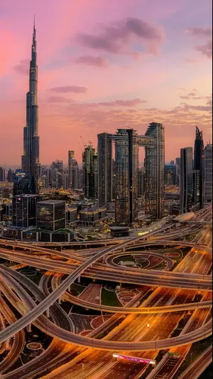 שקיעה על רקע מגדל בורג' קליפה בדובאי. דין אריאל, אתר רשמי