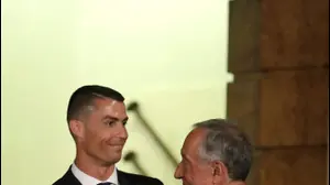 כריסטיאנו רונאלדו עם נשיא פורטוגל מרסלו רבלו דה סוזה (רויטרס)