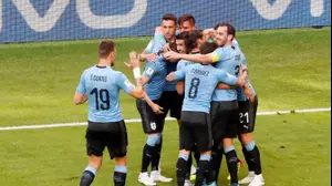 שחקני נבחרת אורוגוואי חוגגים (רויטרס)