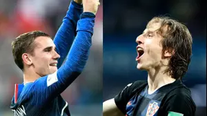 לוקה מודריץ' מול אנטואן גריזמן (AP)