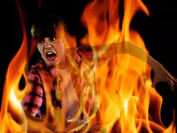 אילוסטרציה ל-1 באפריל: ג'סטין ביבר נשרף (ShutterStock , צילום מסך)