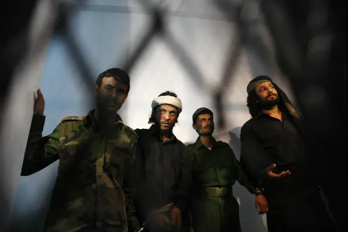 לוחמי אל-קאעדה בבית משפט בצנעא, תימן, 2014 (AP)