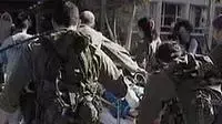 פינוי אחד הפצועים מהפיגוע במחסום ארז צילום מערוץ שתיים פינוי אחד הפצועים מהפיגוע במחסום ארז צילום מערוץ שתיים