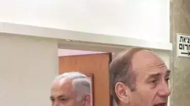 אהוד אולמרט ובנימין נתניהו (פייר תורגמן באובאו) אהוד אולמרט ובנימין נתניהו (פייר תורגמן באובאו)